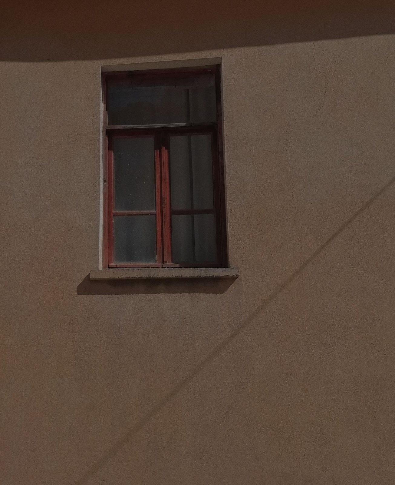 Grid-led metal windows on an architectural facade